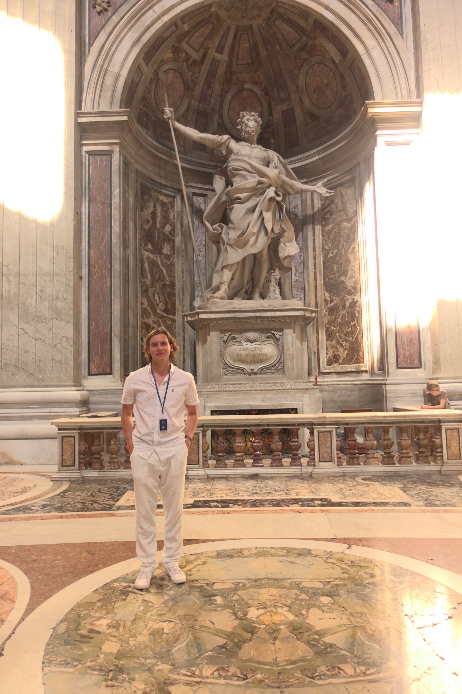 Kacper Bartosiewicz standing inside a historic building